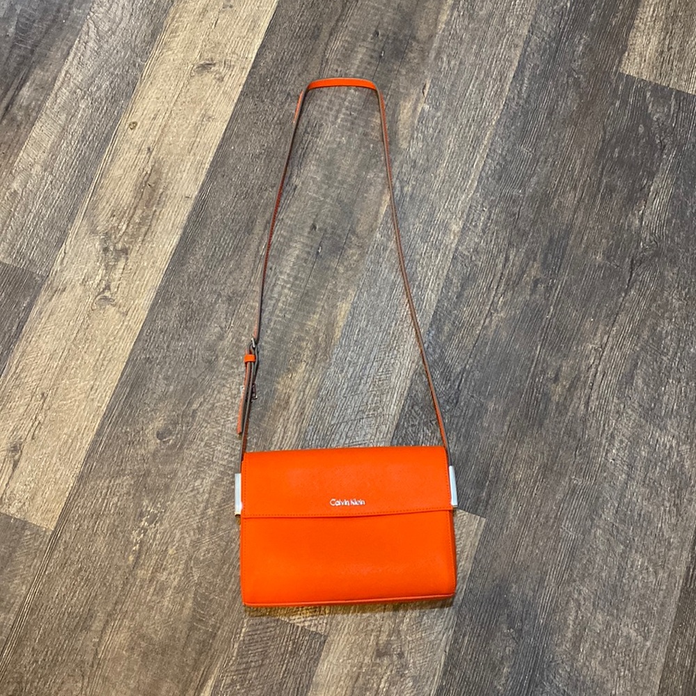 Brand new Calvin Klein, orange Crossbody purse